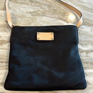 Kate Spade crossbody handbag. Black with light leather adjustable strap